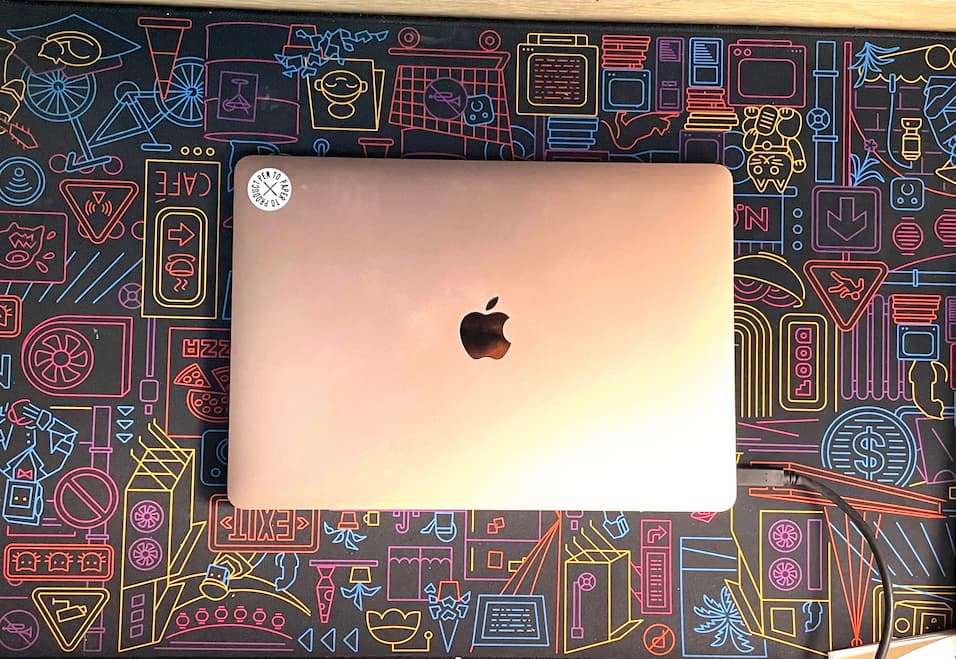 Laptop cover lid with only one sticker on the top left corner