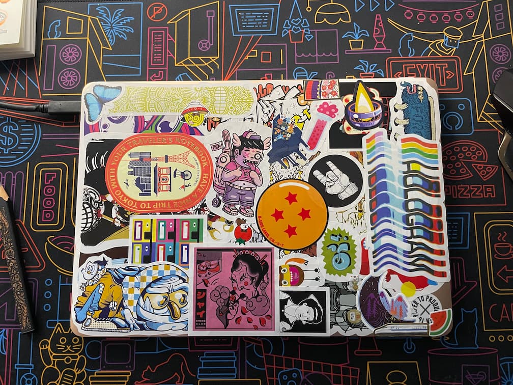 Laptop cover lid fully covered in all styles of stickers